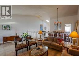 Family room - 11 Maple Place, Crossfield, AB T0M0S0 Photo 10