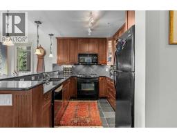 Den - 202, 140 Stonecreek Road, Canmore, AB T1W3J3 Photo 8