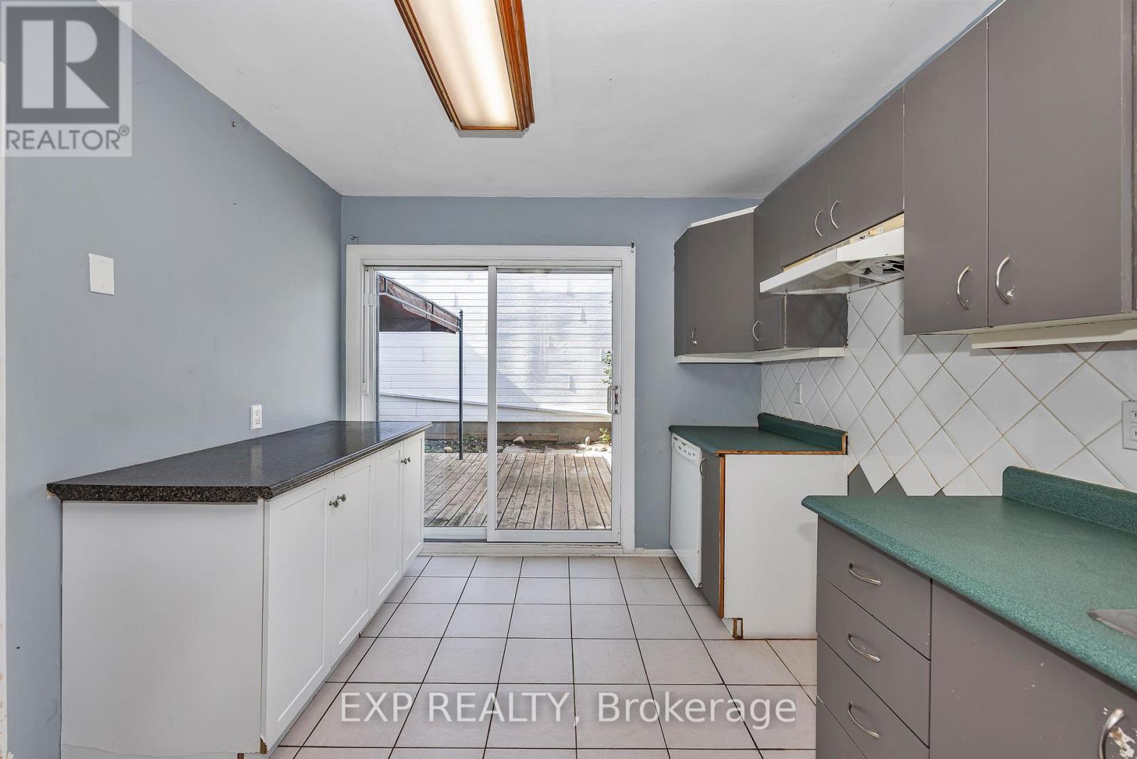 Kitchen with door to patio