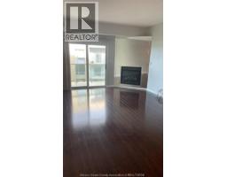 Living room/Fireplace - 4789 Riverside Drive East Unit# 1006, Windsor, ON N8Y5A2 Photo 6