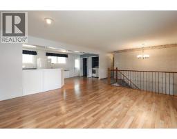 Living room - 58 N 1a Street E, Magrath, AB T0K1J0 Photo 7