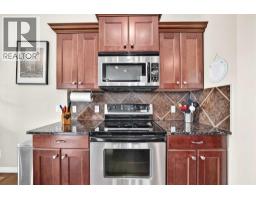 Living room - 212 Aspenmere Close, Chestermere, AB T1X0G3 Photo 9
