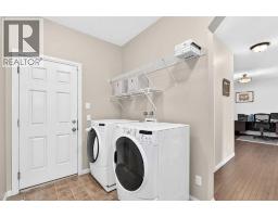 Bedroom - 212 Aspenmere Close, Chestermere, AB T1X0G3 Photo 16