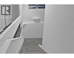 Living room/Dining room - 5009 41 Street Close, Innisfail, AB T4G1H8 Photo 7