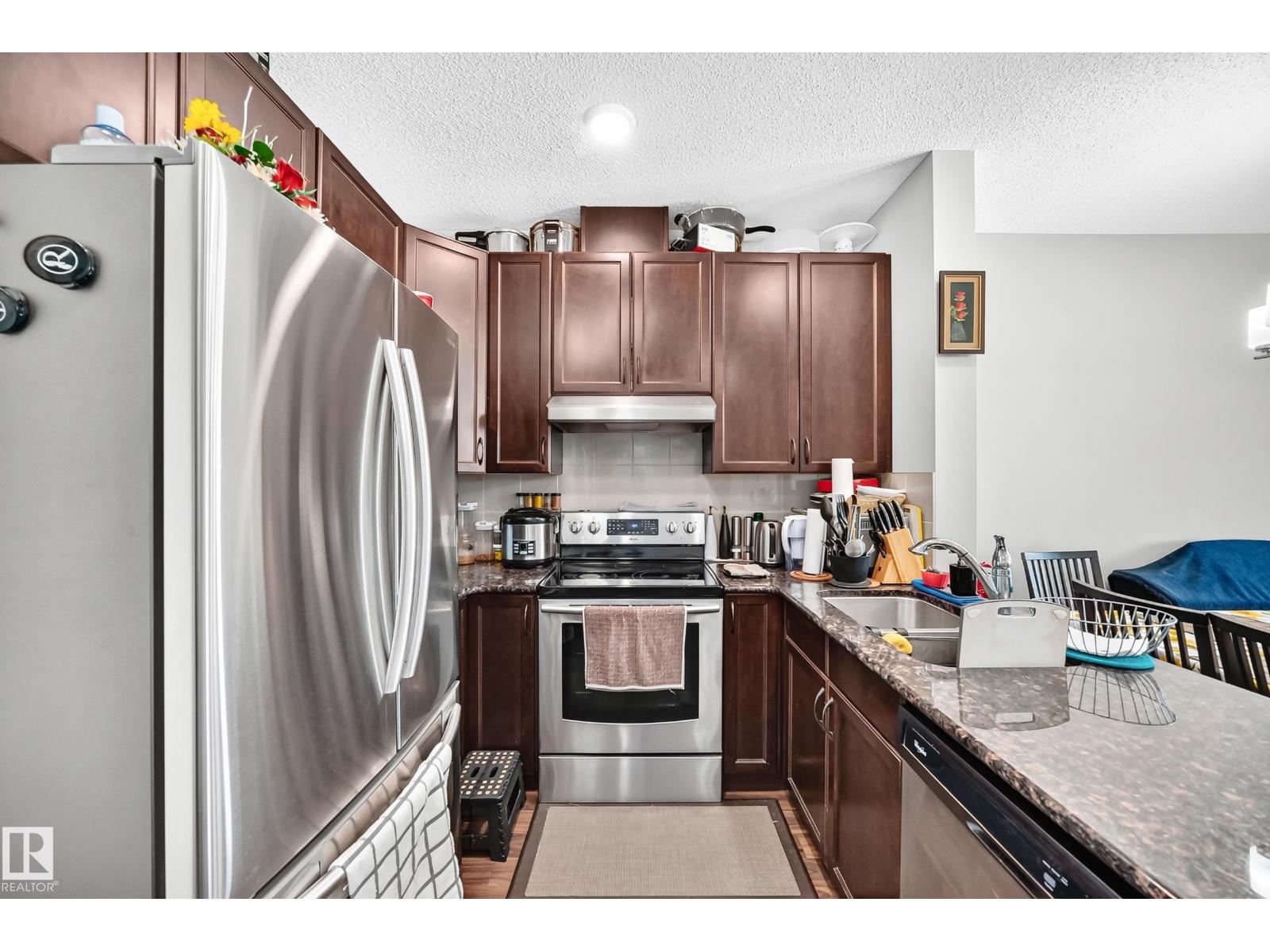 #404 12804 140 AV NW - 5