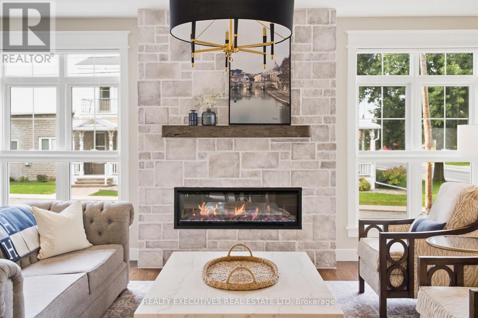 Cozy Fireplace and elegant stone wall