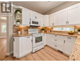 Family room - 319 Cimarron Bay, Okotoks, AB T1S1R6 Photo 12