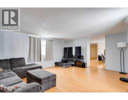 Living room - 101 Clausen Crescent, Fort Mcmurray, AB T9K2H8 Photo 7