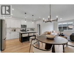 Family room - 76 Heirloom Drive Se, Calgary, AB T3M2M6 Photo 12