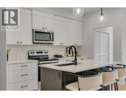 76 Heirloom Drive Se, Calgary, AB T3M2M6 Photo 24