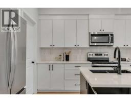 76 Heirloom Drive Se, Calgary, AB T3M2M6 Photo 23