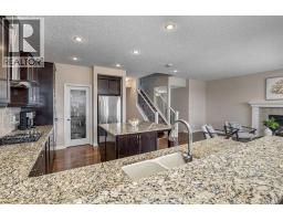 Laundry room - 128 Sunset Park, Cochrane, AB T4C0N5 Photo 11