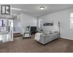 Den - 128 Sunset Park, Cochrane, AB T4C0N5 Photo 15