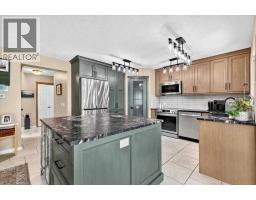 2pc Bathroom - 47 Cimarron Hill, Okotoks, AB T1S1M9 Photo 9
