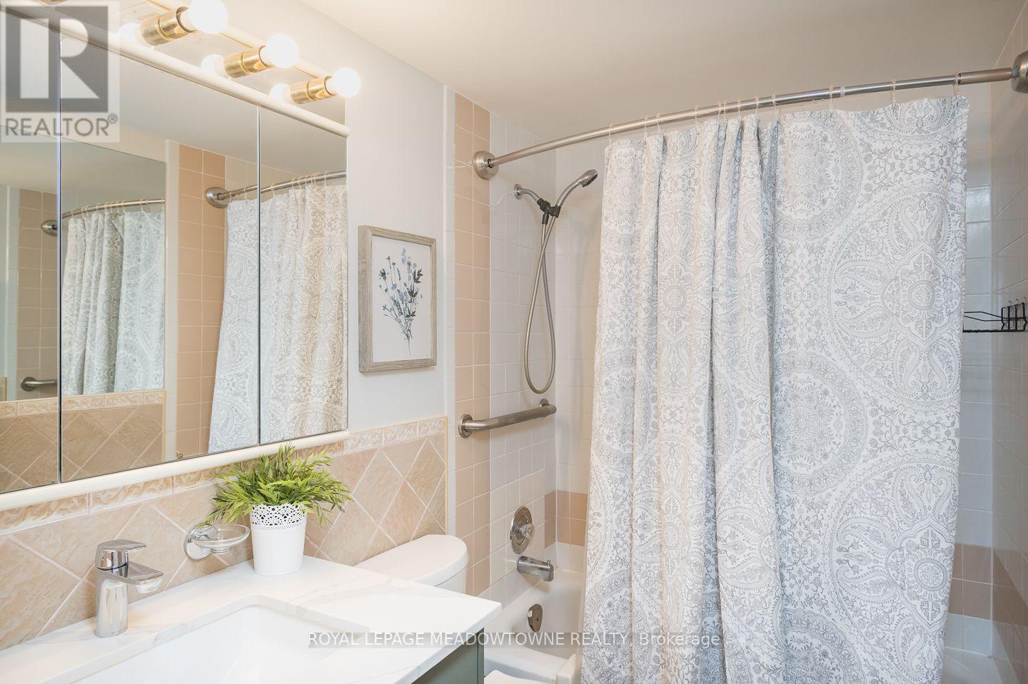 #704 81 MILLSIDE DRIVE - 33
