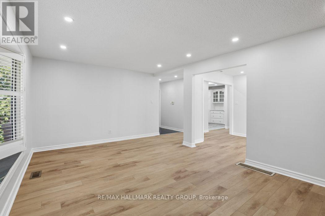 Hardwood and pot-lighting throughout.