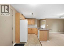 Kitchen - 112, 186 Kananskis Way, Canmore, AB T1W0A2 Photo 6