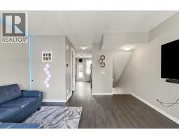 Living room - 303, 125 Caribou Crescent, Red Deer, AB T4P0V6 Photo 6