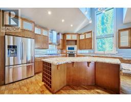 32 Evercreek Bluffs Crescent SW - photo 16