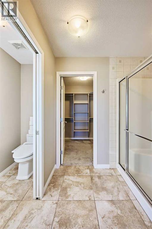 32 Evercreek Bluffs Crescent SW - photo 31