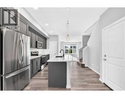 Family room - 97 Herron Mews Ne, Calgary, AB T3P1Y7 Photo 12