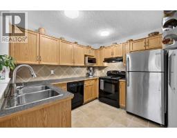 Family room - 211 Bayside Point Sw, Airdrie, AB T4B2X6 Photo 10