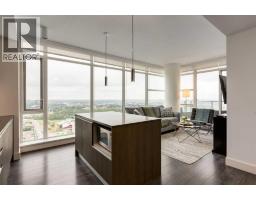 Living room - 2802, 1188 3 Street Se, Calgary, AB T2G1H8 Photo 8