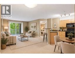Living room - 2208, 2518 Fish Creek Boulevard Sw, Calgary, AB T2Y4T6 Photo 6