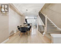 Living room - 39 Lobo Mews, Toronto, ON M8Z0B2 Photo 8