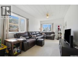 Living room - 100 Pike Lake Road, Vanscoy, SK S0L3J0 Photo 6