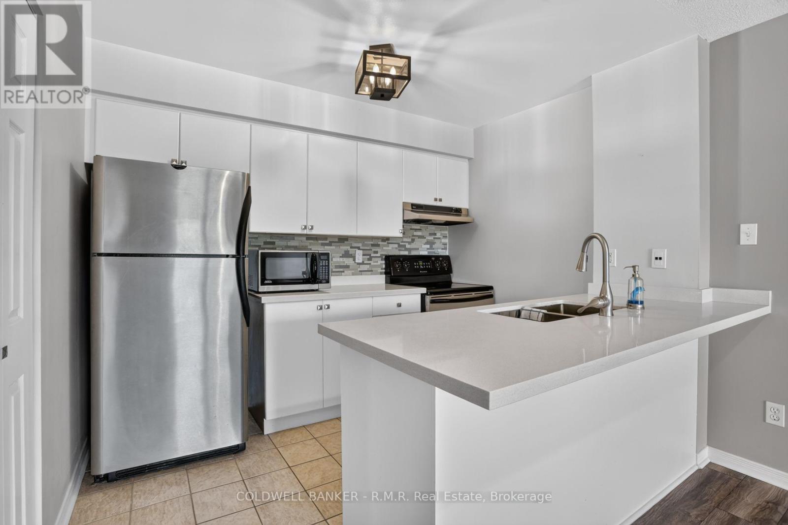 210 - 106 ASPEN SPRINGS DRIVE, Clarington (Bowmanville) — photo 11