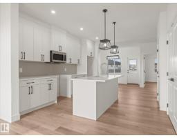 Laundry room - 423 Bank Wynd, Leduc, AB T9E1W1 Photo 8