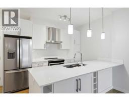 212, 122 Mahogany Centre SE - photo 4