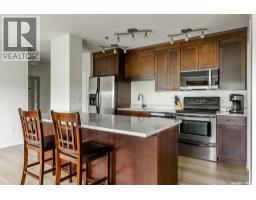 Laundry room - 409 902 Spadina Crescent E, Saskatoon, SK S7K0G8 Photo 9