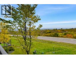 Family room - 627, 101 Sunset Drive, Cochrane, AB T4C0W8 Photo 15