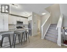 Laundry room - 627, 101 Sunset Drive, Cochrane, AB T4C0W8 Photo 9