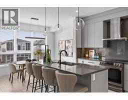 Bedroom - 217, 7820 Spring Willow Drive Sw, Calgary, AB T3H6E1 Photo 11