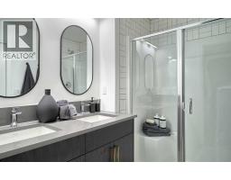 4pc Bathroom - 684 Rowmont Boulevard Nw, Calgary, AB T3L0L6 Photo 9