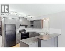 Living room - 141 Thornfield Close Se, Airdrie, AB T4A2K8 Photo 8