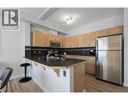 2205, 211 Aspen Stone Boulevard SW - photo 7