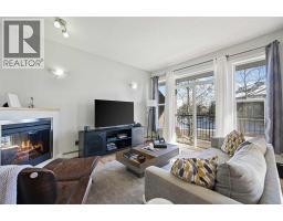 2205, 211 Aspen Stone Boulevard SW - photo 2