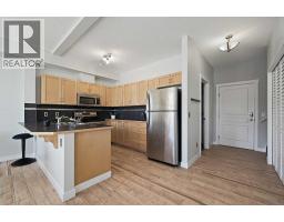 2205, 211 Aspen Stone Boulevard SW - photo 6