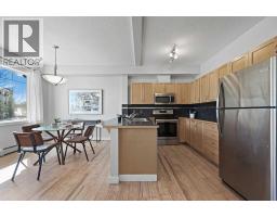 2205, 211 Aspen Stone Boulevard SW - photo 8
