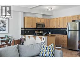 2205, 211 Aspen Stone Boulevard SW - photo 13