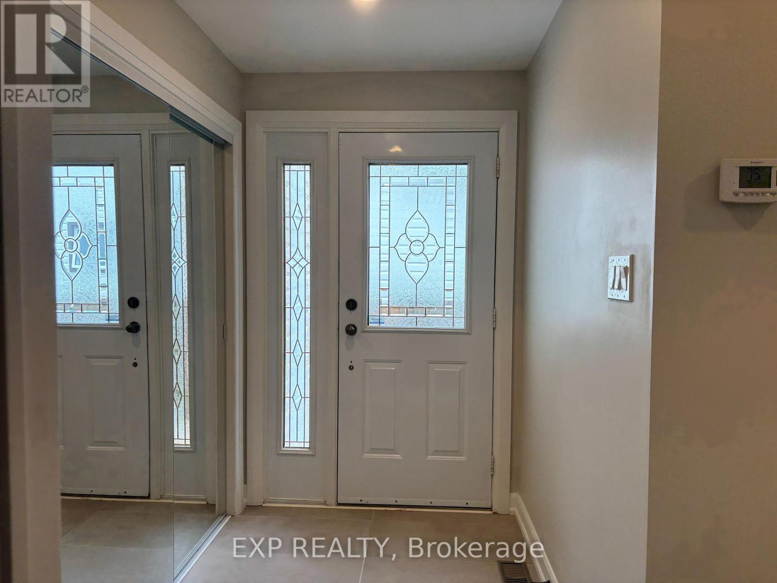 Main Foyer with large closet behing mirror doors
