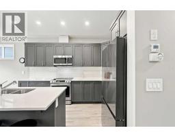 Laundry room - 5009 Windsong Boulevard Sw, Airdrie, AB T4B5L2 Photo 8