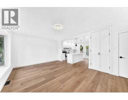 Living room - 5603 Trelle Drive Ne, Calgary, AB T2K3V3 Photo 8