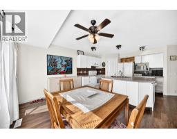 Living room - 14954 Mt Mckenzie Drive Se, Calgary, AB T2Z2L4 Photo 13