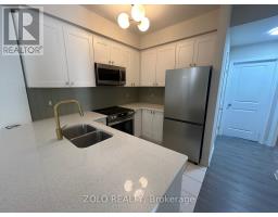 Utility room - 306 - 263 Georgian Drive, Oakville, ON L6H0L2 Photo 7
