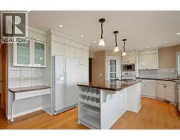 Laundry room - 1340 Shawnee Road Sw, Calgary, AB T2Y2S7 Photo 14